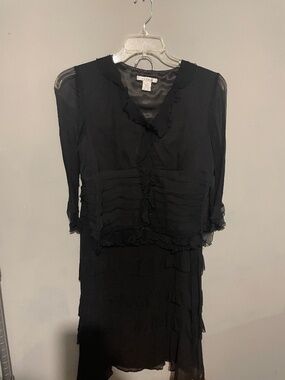 ZBD Designs. Black skirt set with layered ruffles and sheer sleeves. women’s 10
